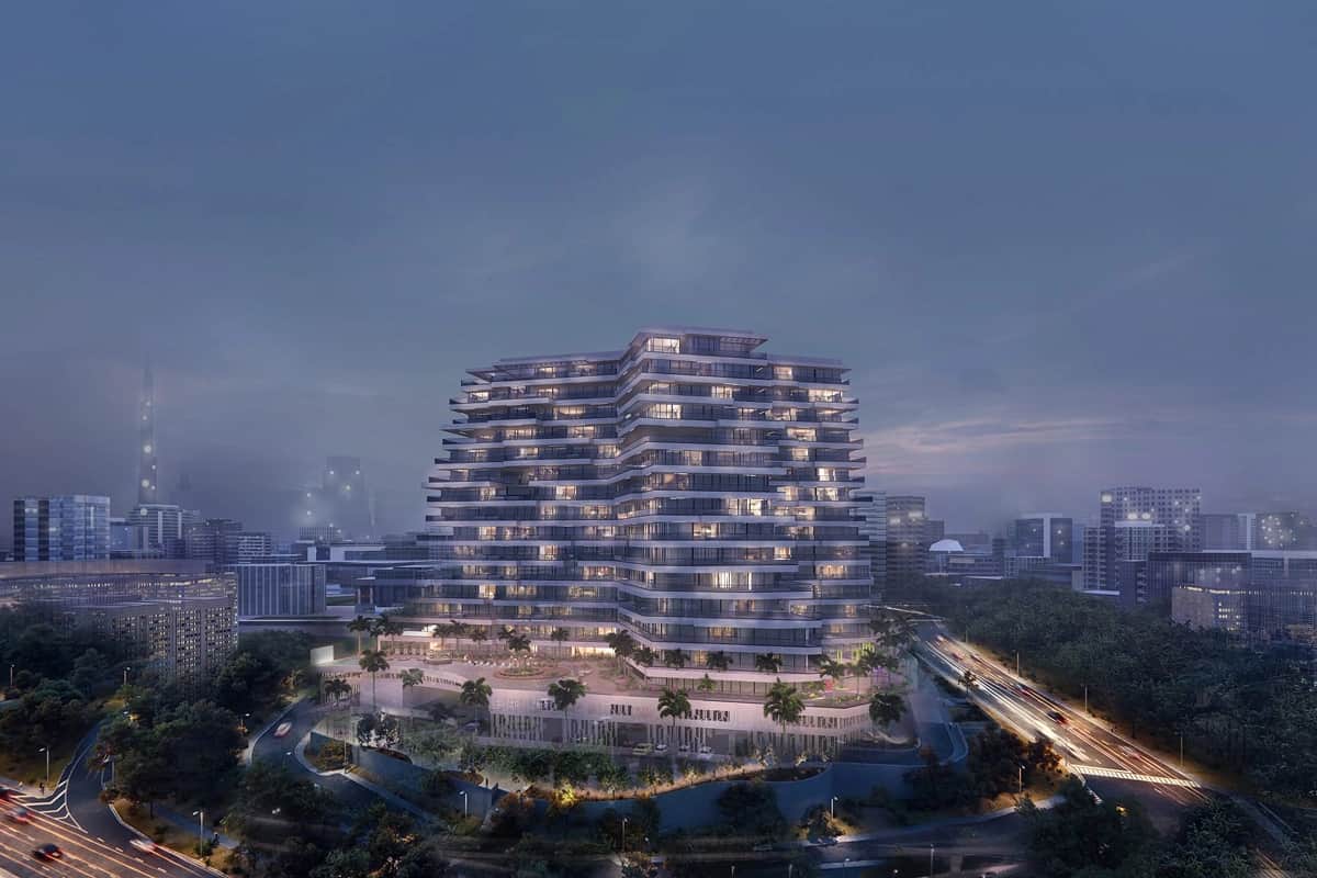Exclusive residential complex with a large pool and green landscape.