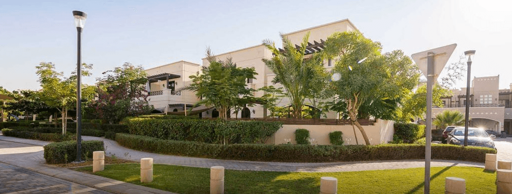 Residential street in Mudon with modern villas and landscaping