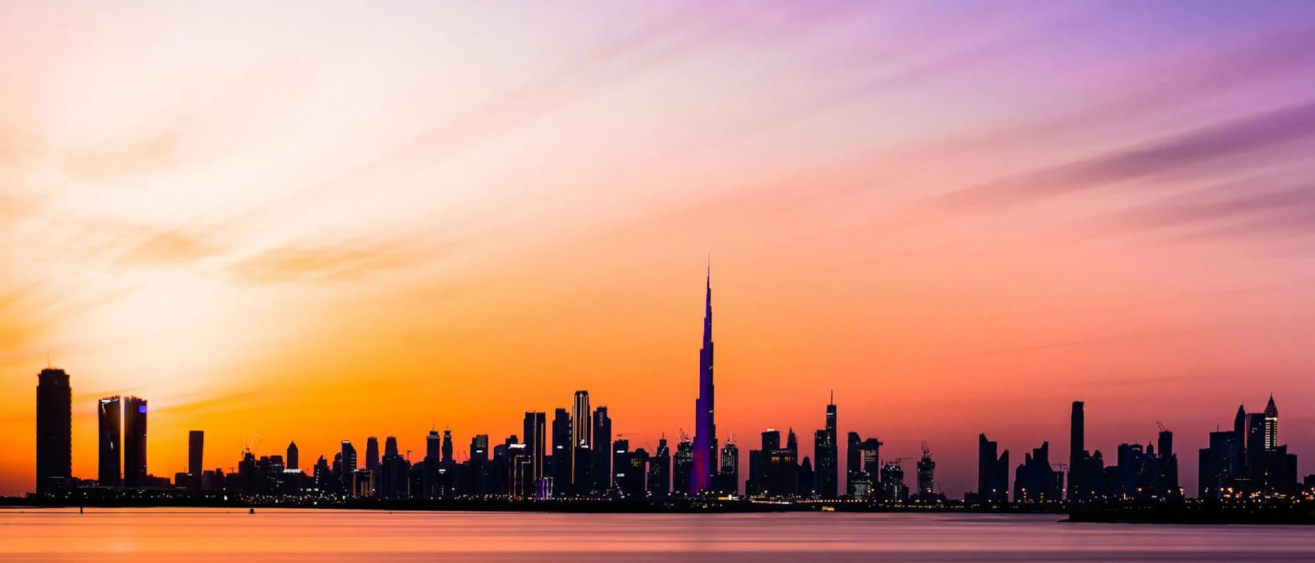 Dubai skyline with Burj Khalifa at sunset