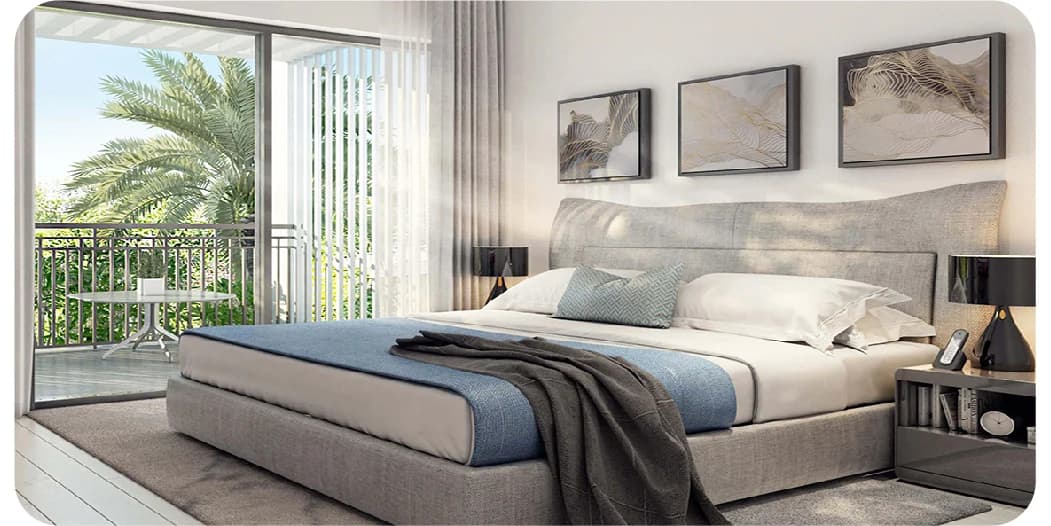Opulent bedroom with textured wall, chandelier, and garden view