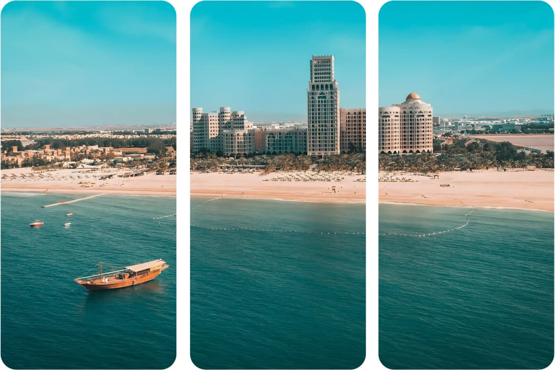 منظر جوي لشاطئ وقارب ومنتجع فاخر في رأس الخيمة