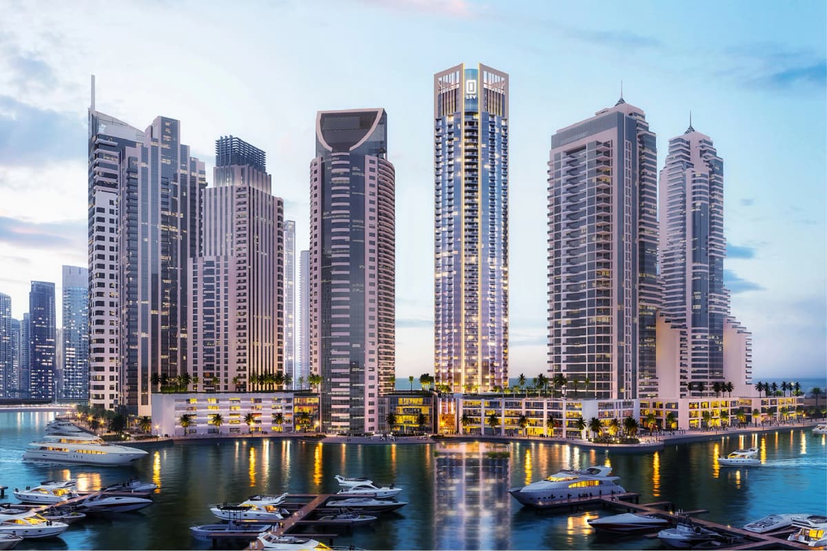 Luxury waterfront towers with yachts and marina view