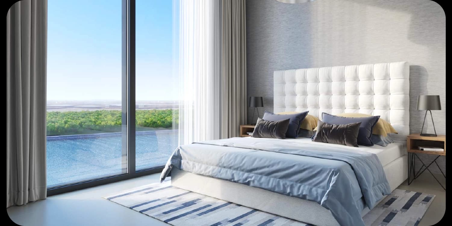 Modern bedroom with pool view and neutral tones