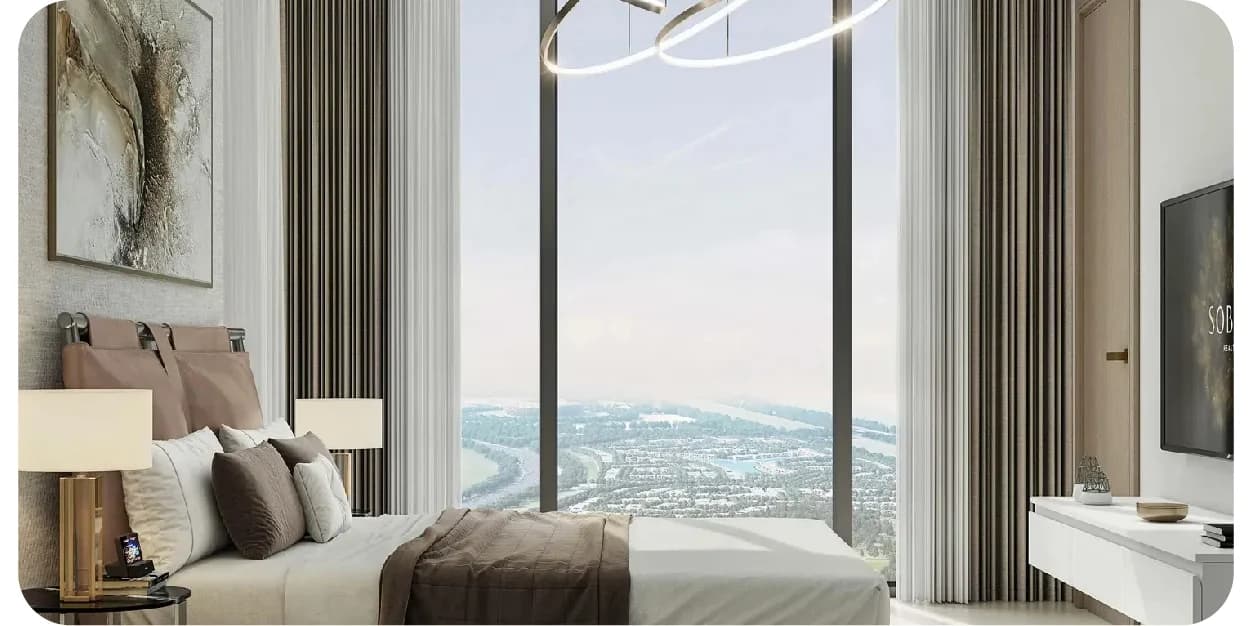Modern bedroom with a large window overlooking a city