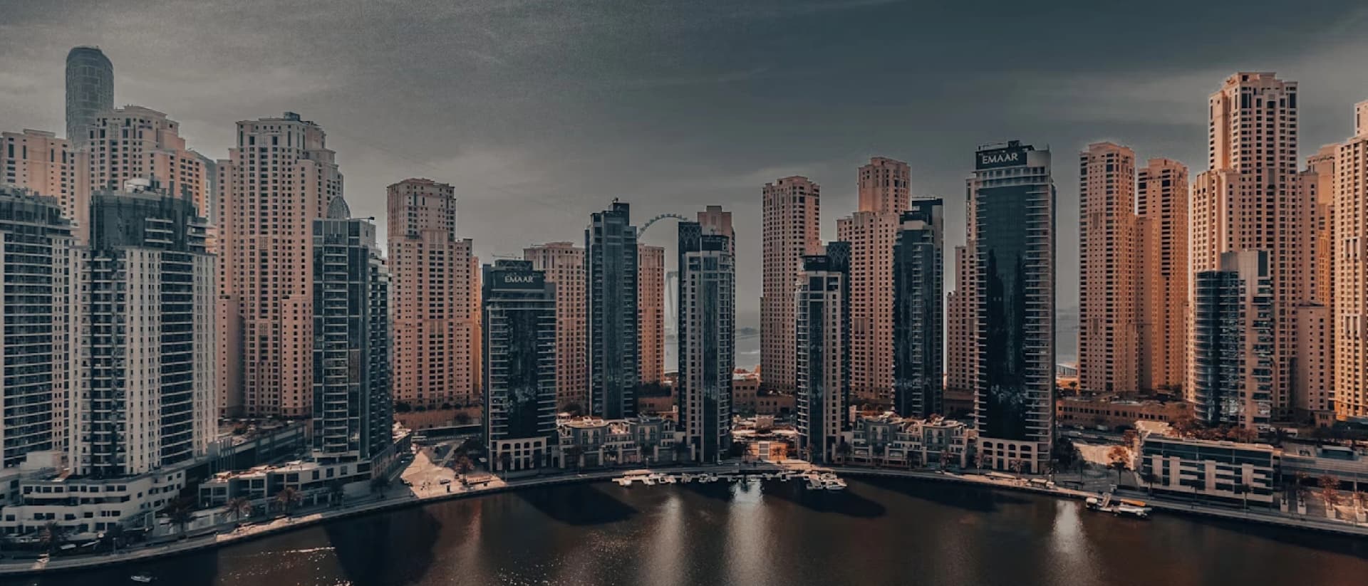 Dubai Creek with traditional boats and waterfront buildings