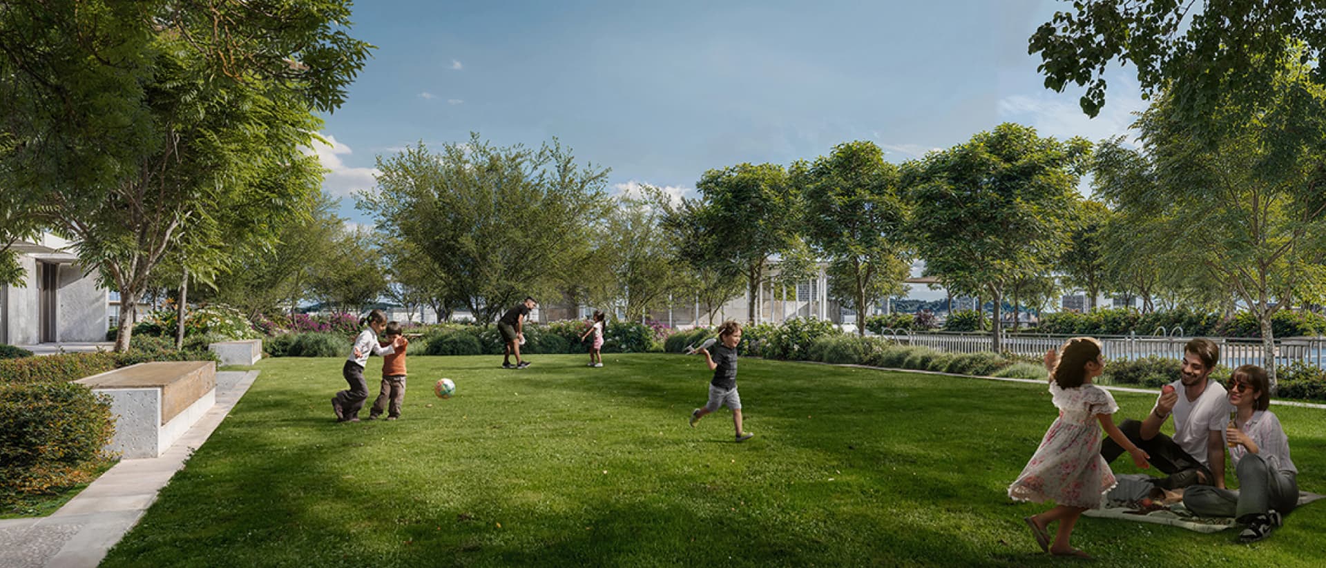 People enjoying a sunny day in a green, landscaped park
