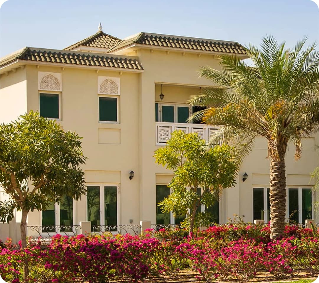 A high-rise residential building with a warm lighting ambiance