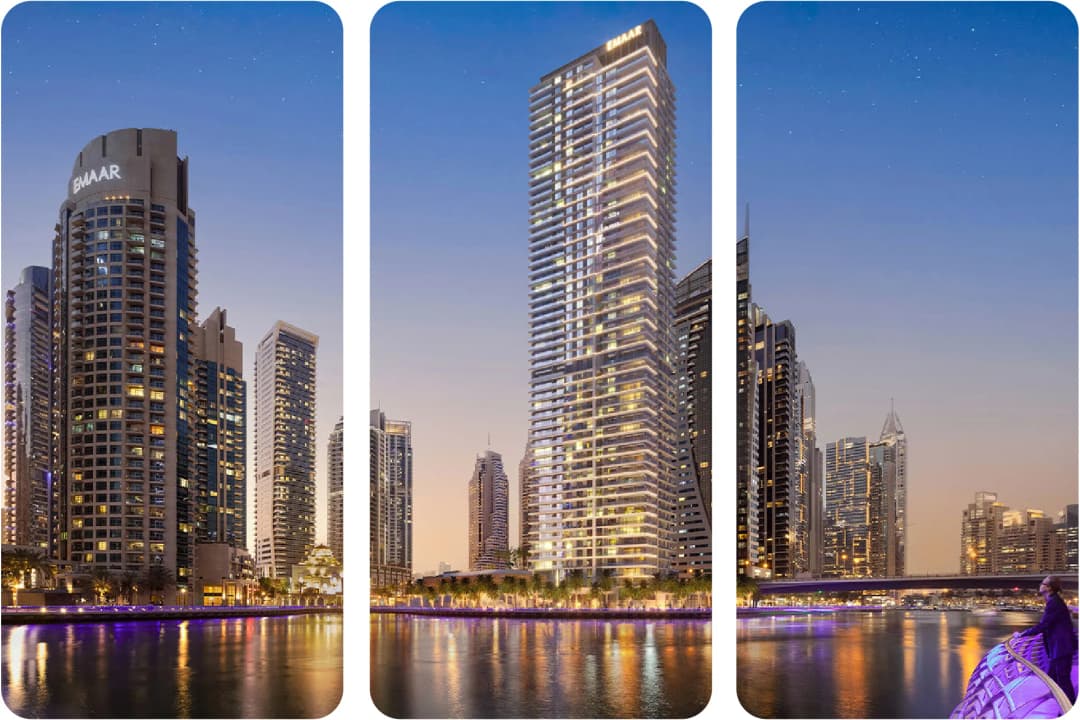 Emaar tower buildings in Dubai skyline at dusk