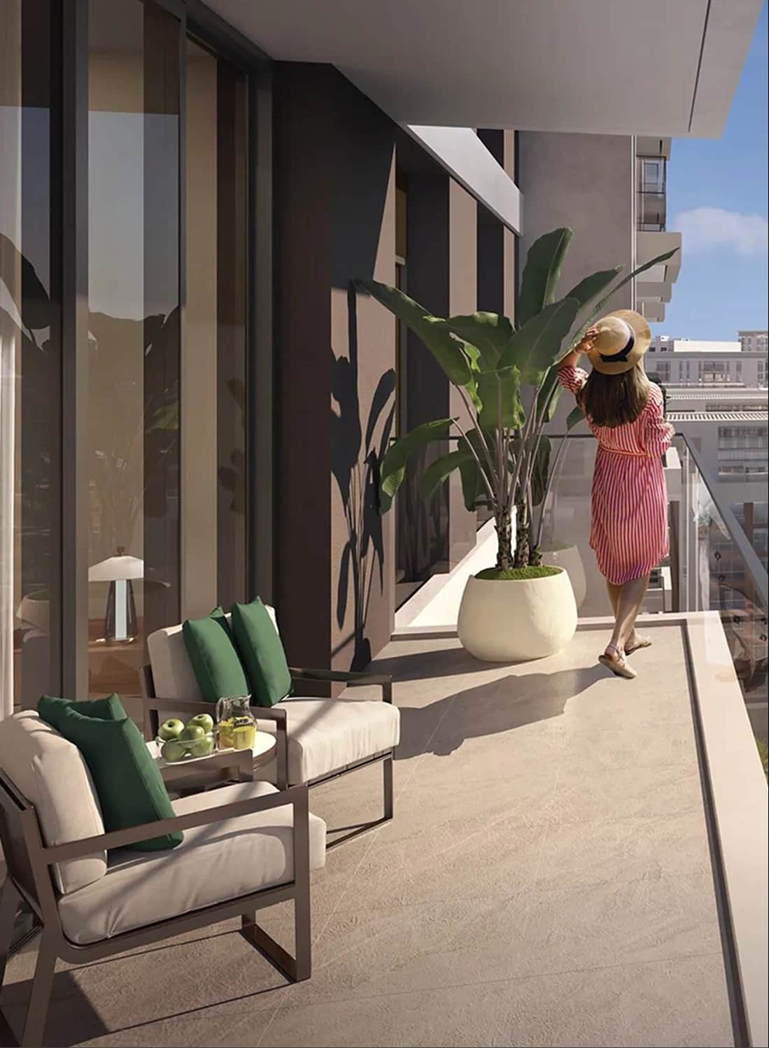 Woman enjoying a balcony with modern furniture and plants