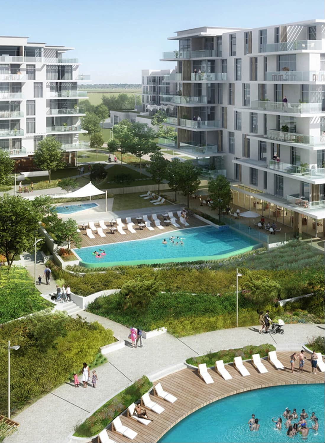 Vibrant community with pools and modern buildings in greenery
