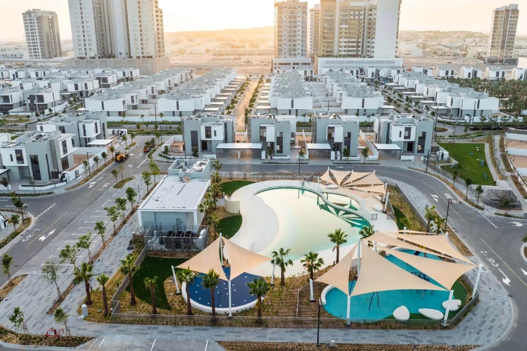 Aerial view of residential buildings with a swimming pool