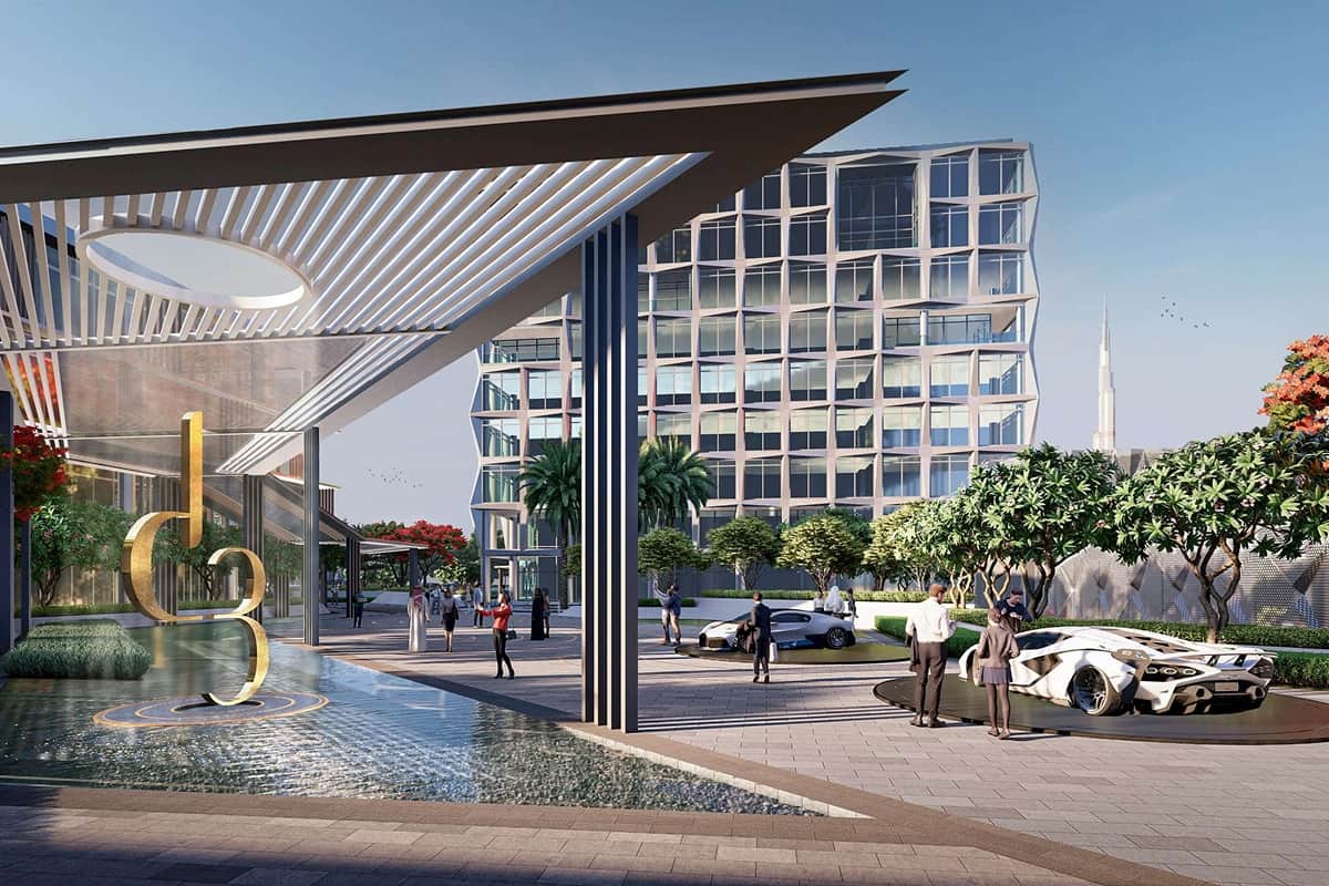 Modern luxury building with a sculpture, palm trees, and high-end cars