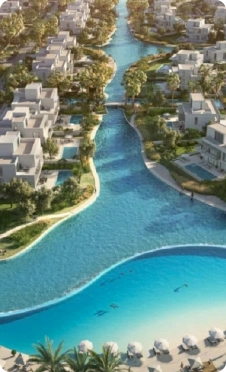 The villas with surrounding lagoon water at oasis by emaar