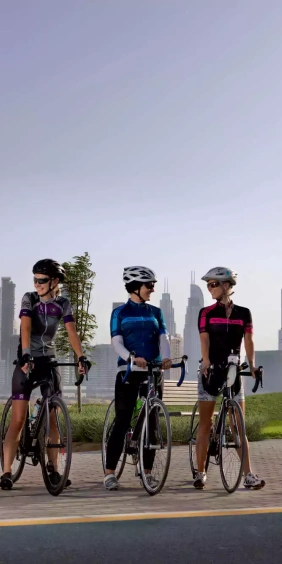 students riding cycle in the park