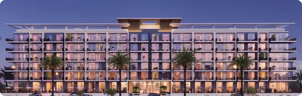 Elegant multi-story residential building with large balconies, palm trees, and warm evening lighting, showcasing modern urban architecture.