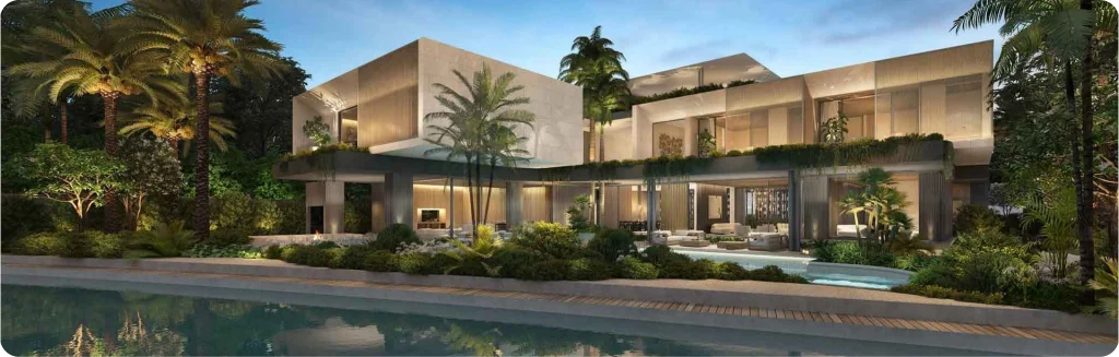 A modern, spacious villa with a swimming pool, surrounded by lush greenery and a water channel.